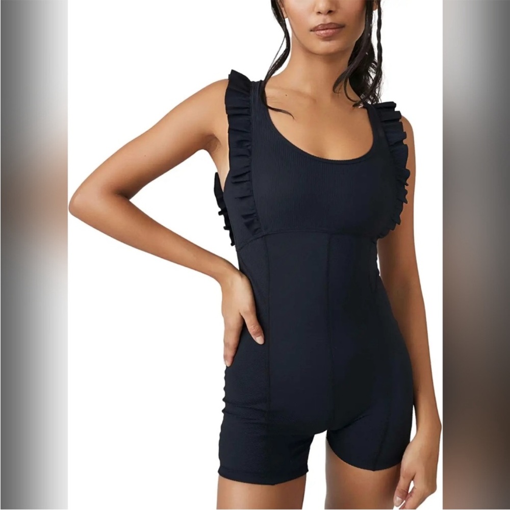 Free People x FP movement black ruffle me up one piece shortsie
